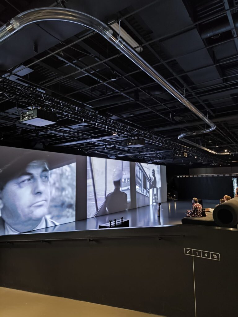 Inside of the museum, videos displayed CAMP