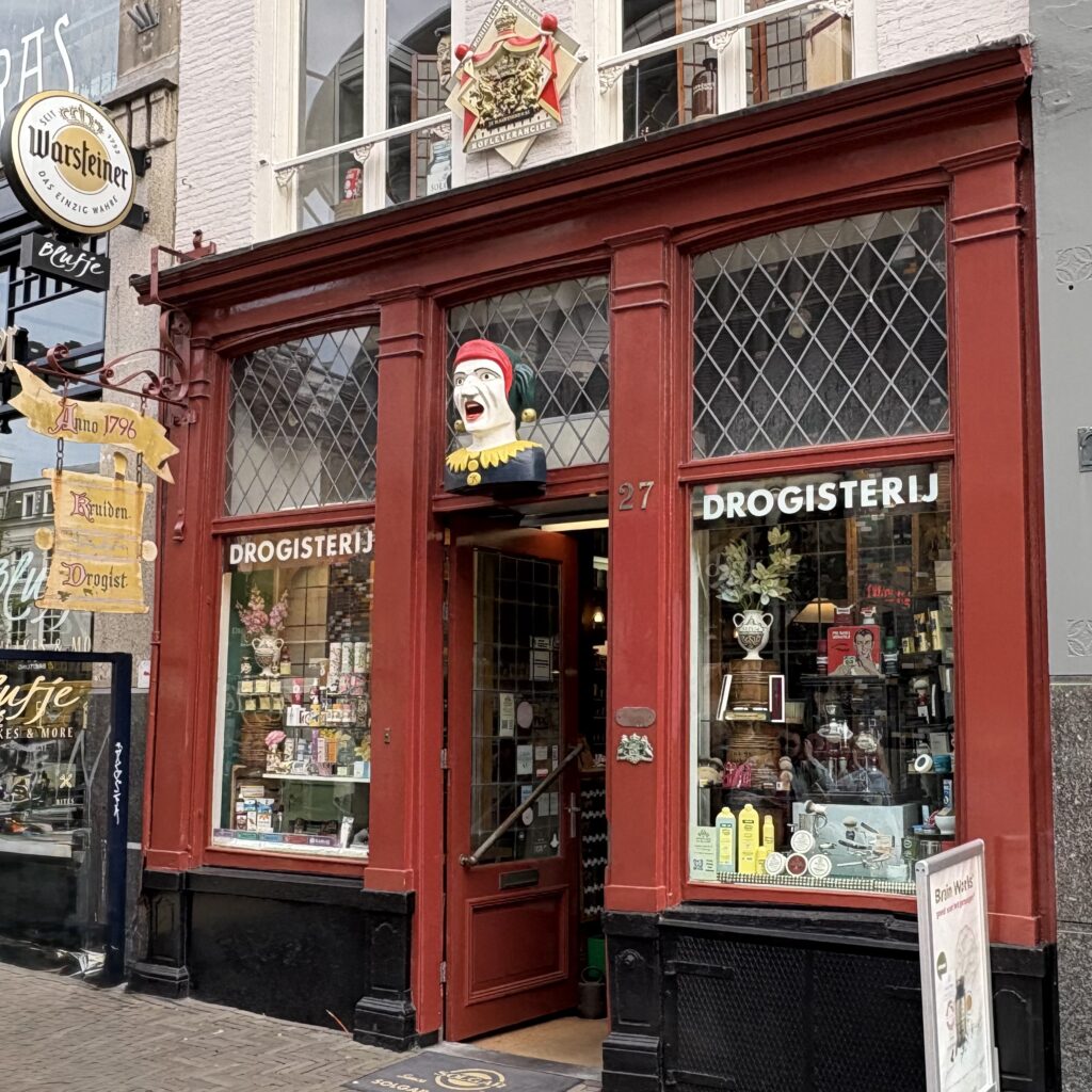 Drogisterij van der Gaag. ©SpottedByLocals Historic red storefront of Drogisterij van der Gaag in The Hague.