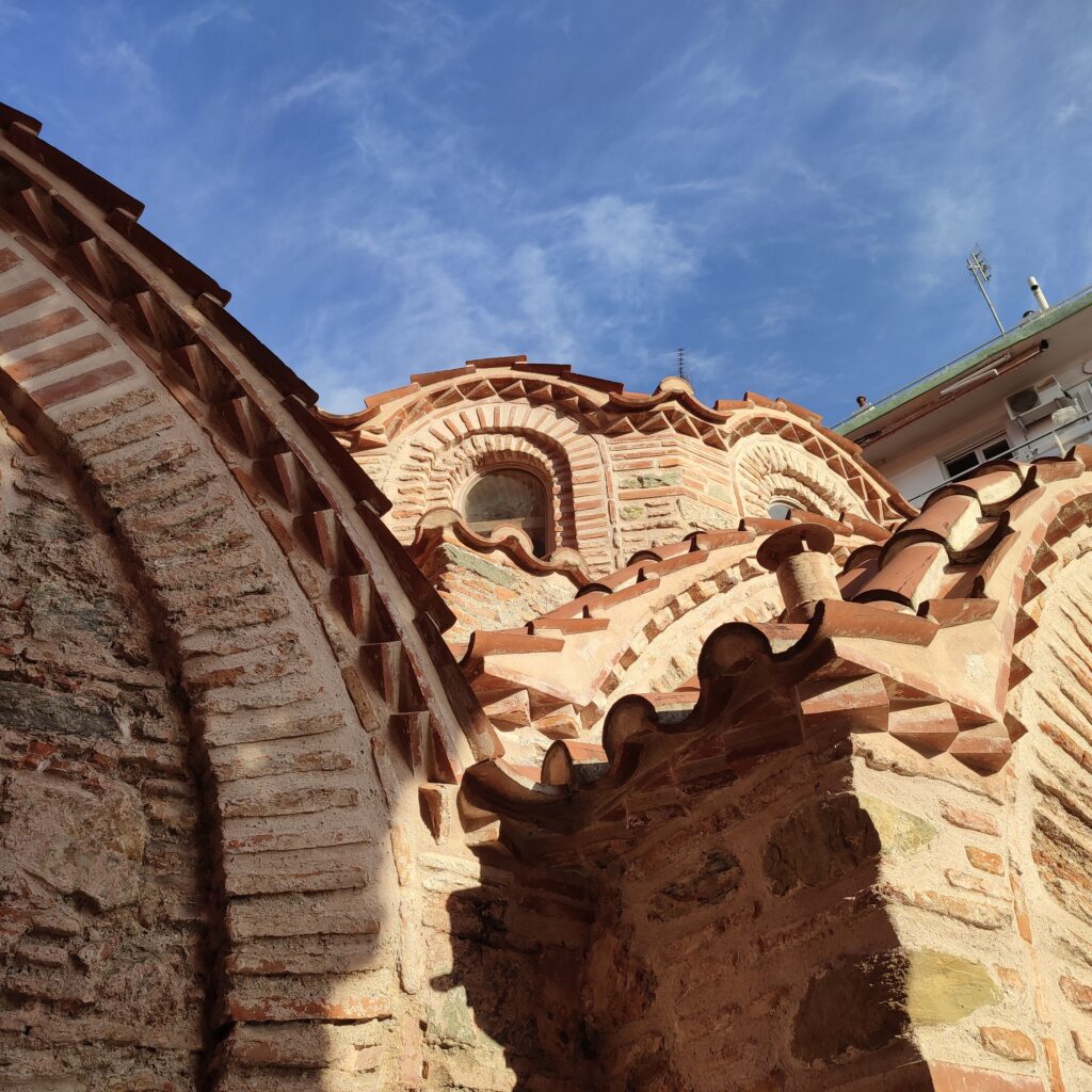 Byzantine Bath. ©ThanasisKoukopoulos_ Close-up of the Byzantine Bath in Thessaloniki, showing brick arches, tiled roofs, and historic masonry.