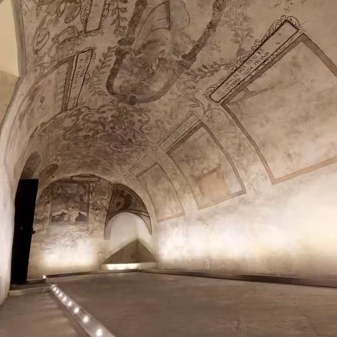 Historic frescoes covering the vaulted ceiling inside the Cellar under Fortuna in Lublin’s Old Town.