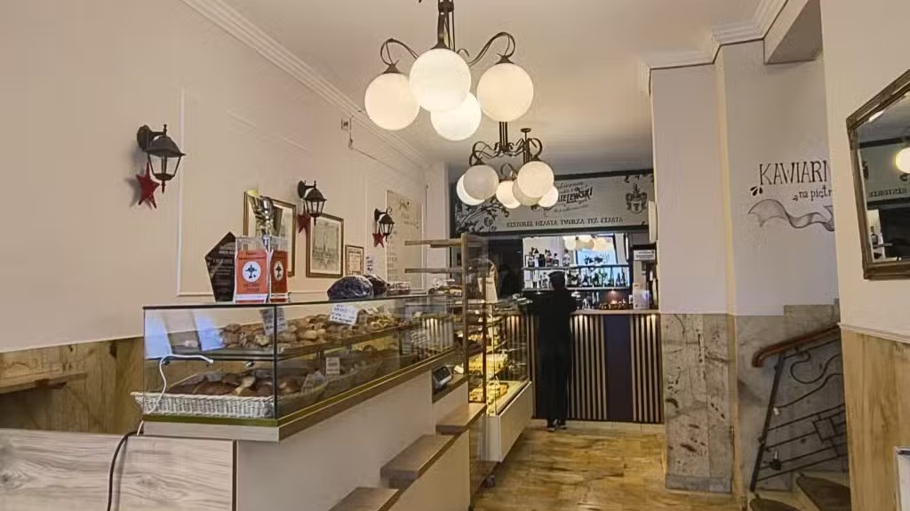 Pastry display and traditional interior at Chmielewski Confectionery in Lublin, Poland.